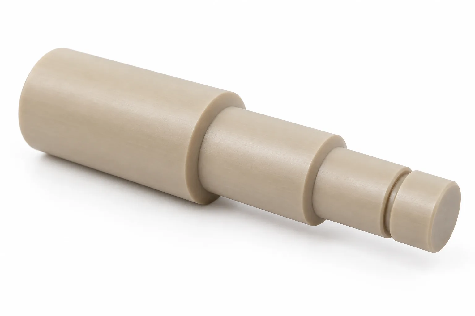 Stepped PEEK Shafts with drawing-specific machined geometry on white