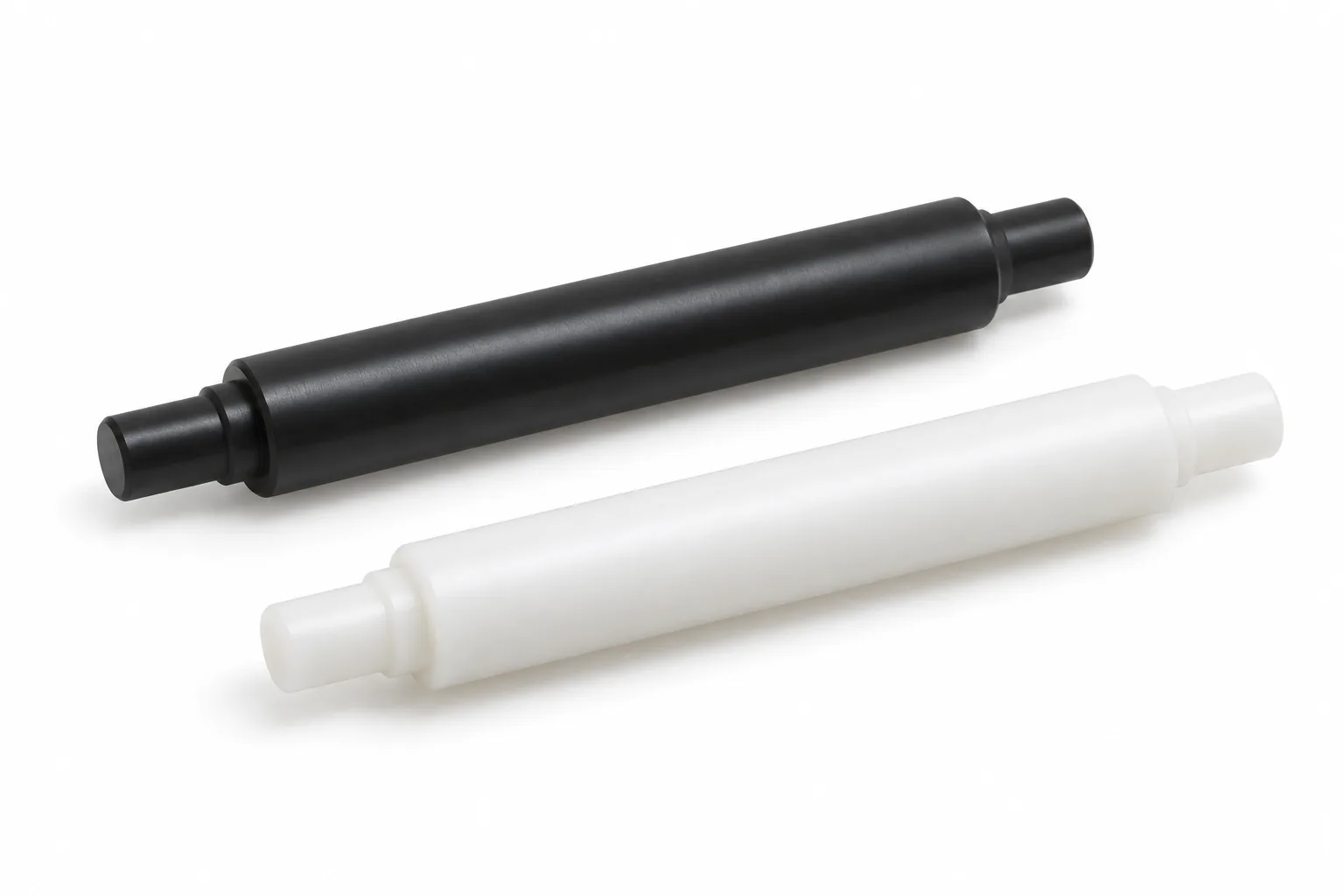 Guide Shafts showing opaque acetal plastic and finished machining features on white