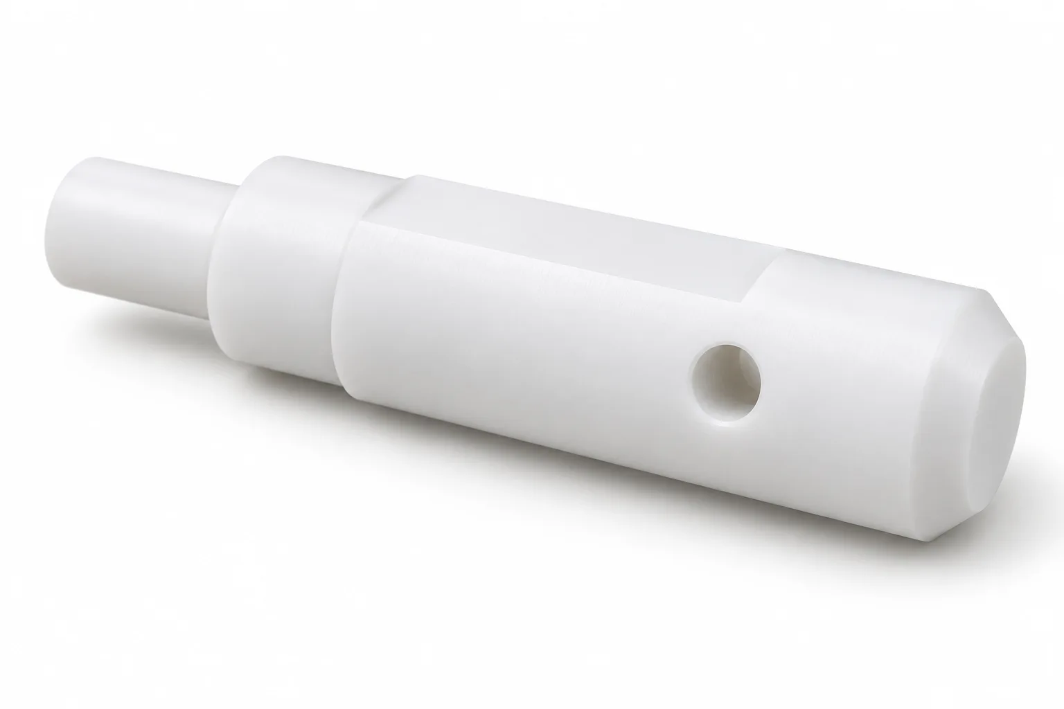 Custom Profile Shafts with opaque white machined PTFE features on a white background